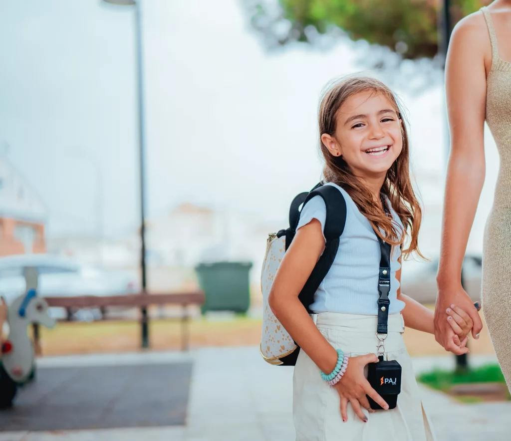 Kid on her way to school wearing kid track
