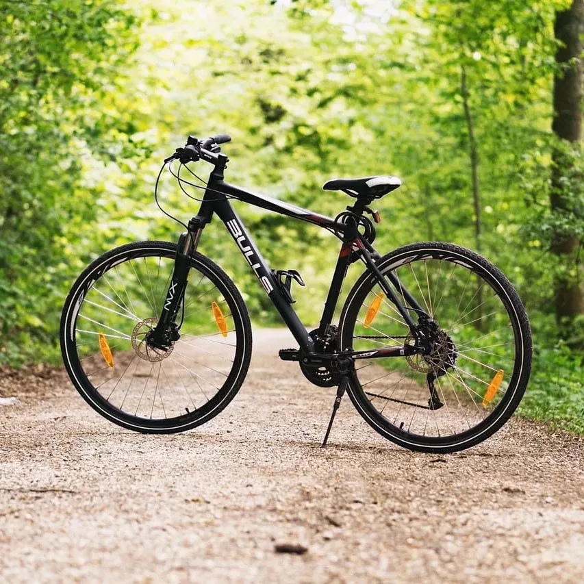 bicycle parked in a road with tracker installed in it