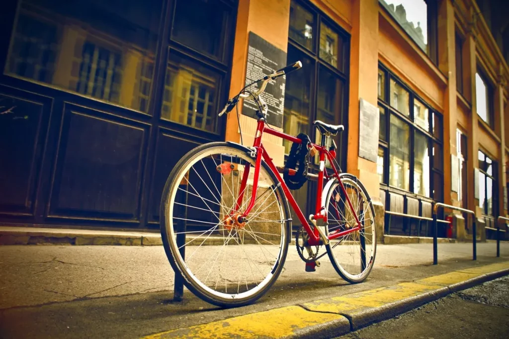 bicycle parked in a street and gps tracker covertly placed in it