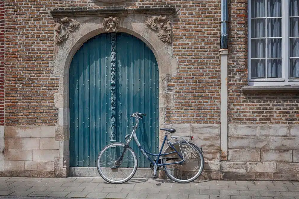 bicycle parked infront of a gate with GPS tracker installed